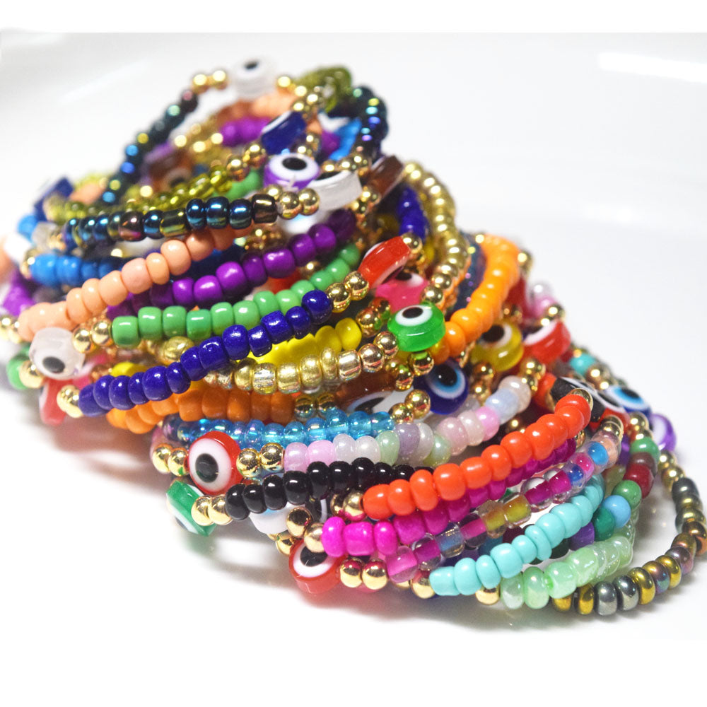 bohemian style stackabele handmade glass rice seed beads beaded elastic devil eye bead charm bracelet jewelry