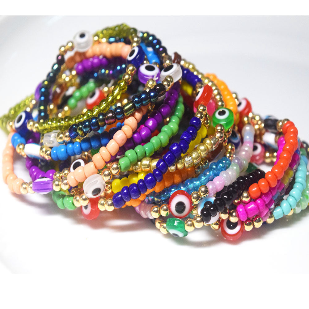 bohemian style stackabele handmade glass rice seed beads beaded elastic devil eye bead charm bracelet jewelry