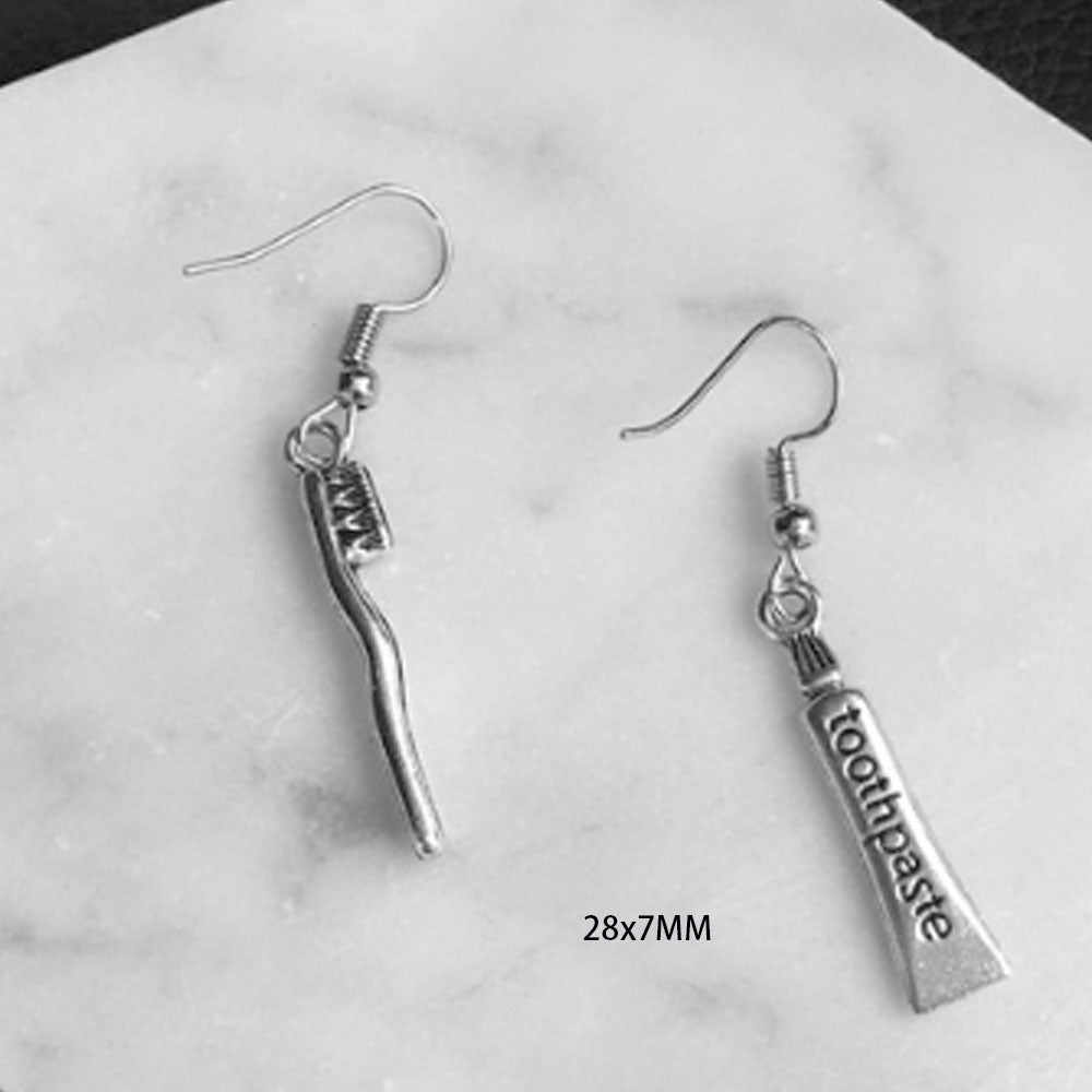 goth alloy ancient silver piercing gun handcuff money toothpaste dangle drop earrings jewelry