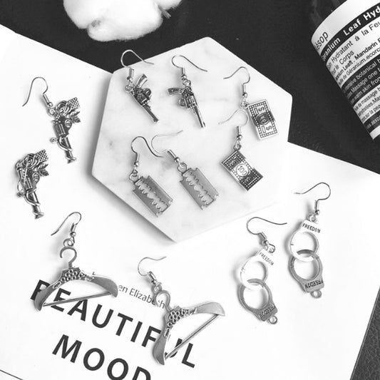 goth alloy ancient silver piercing gun handcuff money toothpaste dangle drop earrings jewelry
